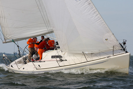 Company outing with a IMX38 sailing yacht